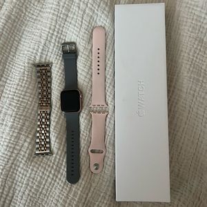 Series 6 Apple Watch Rose Gold, with three bands.